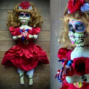 Glow in Dark Day of Dead holding real heart doll